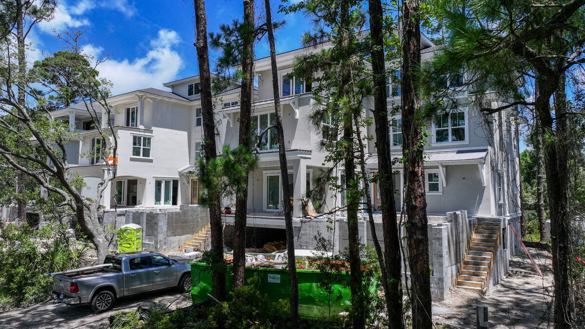 Building permits for these three properties under construction at 15, 17 and 19 Bradley Circle photographed on July 17, 2025, on Hilton Head Island and are all owned by Transcon Industries. While the building permit is for a residential occupancy it is unknown if this owner, who has other short term rentals in the Bradley Circle neighborhood, will list these as STRs upon completion.