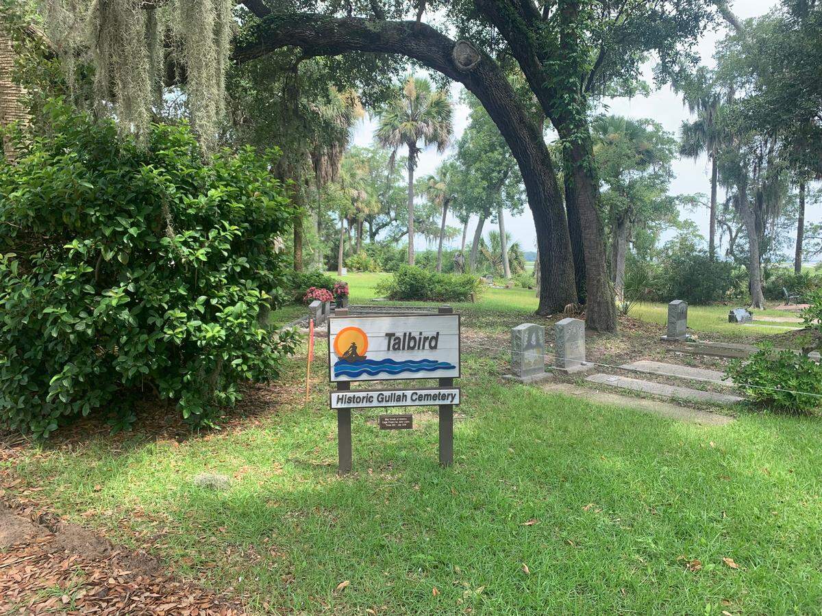 Boundary markers seen behind the sign for Talbird Cemetery