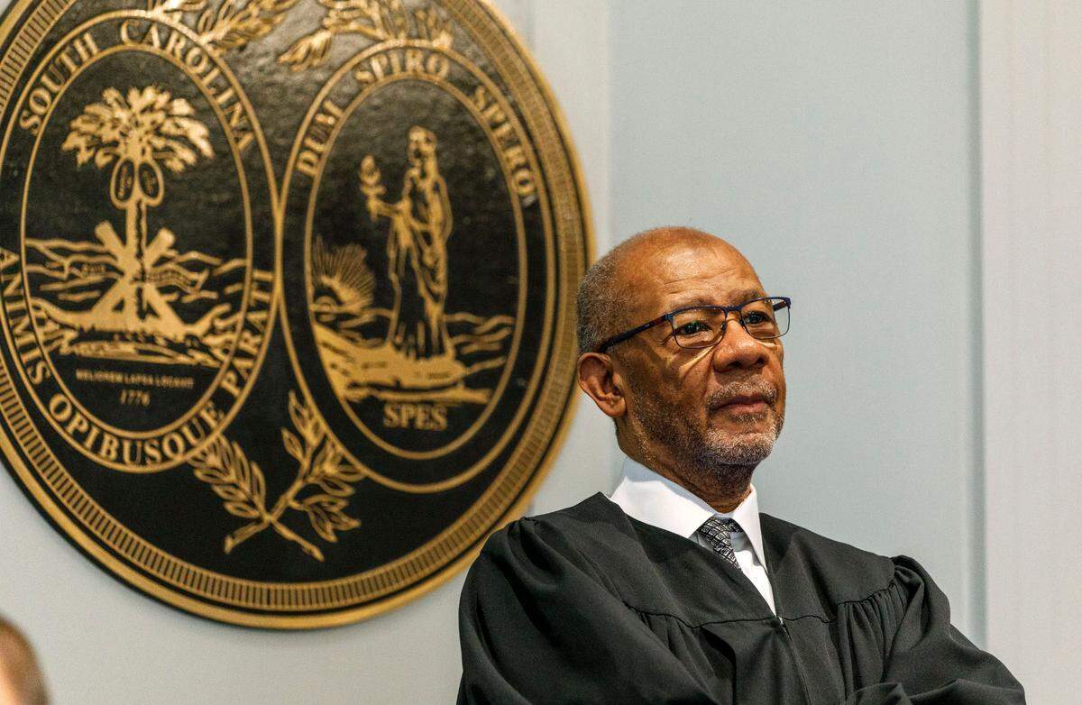 Judge Clifton Newman stands during a break in the Alex Murdaugh double murder trial at the Colleton County Courthouse in Walterboro, Friday, Jan. 27, 2023. Grace Beahm Alford/The Post and Courier/Pool