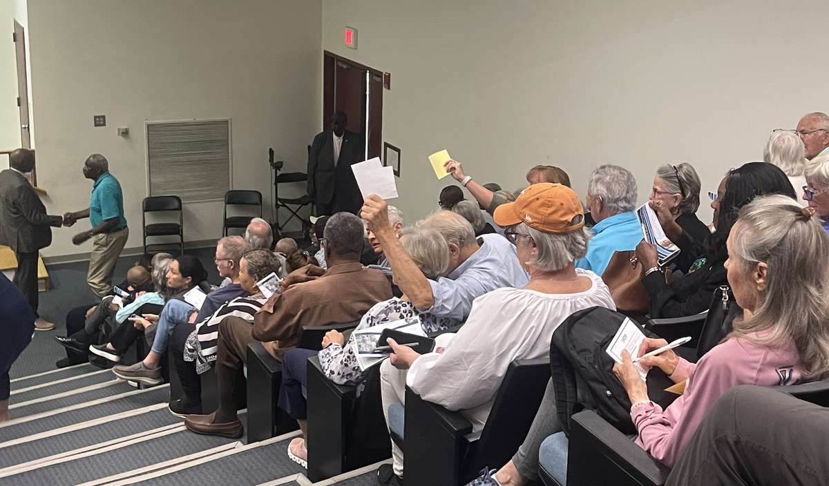 Constituents attending Rep. Jim Clyburn’s town hall in Beaufort hold note cards with their name and question for the South Carolina Congressman.