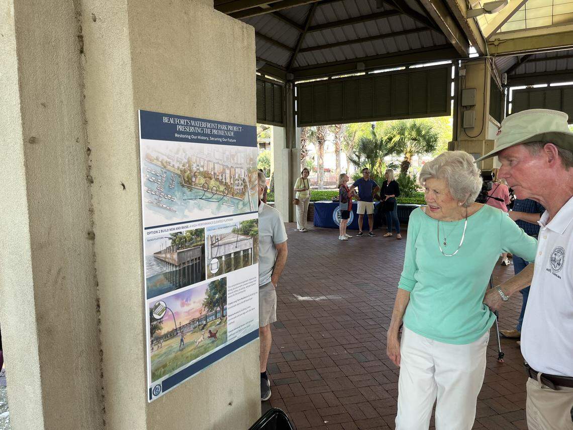 Andy and Betsy Kinghorn check out one of the options for fixing the Beaufort promenade during a meeting Wednesday after Waterfront Park. “This park is one of the key features of the downtown ambience,” Andy Kinghorn said.