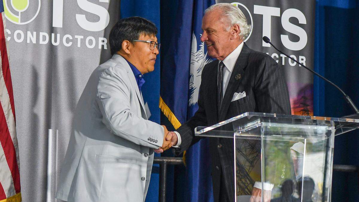 Jason Huang, left, founder and CEO of TS Conductor, shakes hands with S.C. Gov. Henry McMaster on Thursday, March 6, 2025, before the ceremony announcing Huang’s company moving into Clarius Park Hardeeville, a newly opened industrial park in Jasper County. 
