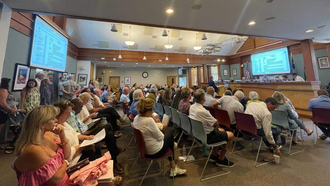 Residents, real estate agents, and short-term rental owners packed town council chambers Tuesday evening for a discussion on whether a temporary pause on short-term rentals could help the town focus its resources on updating regulations.