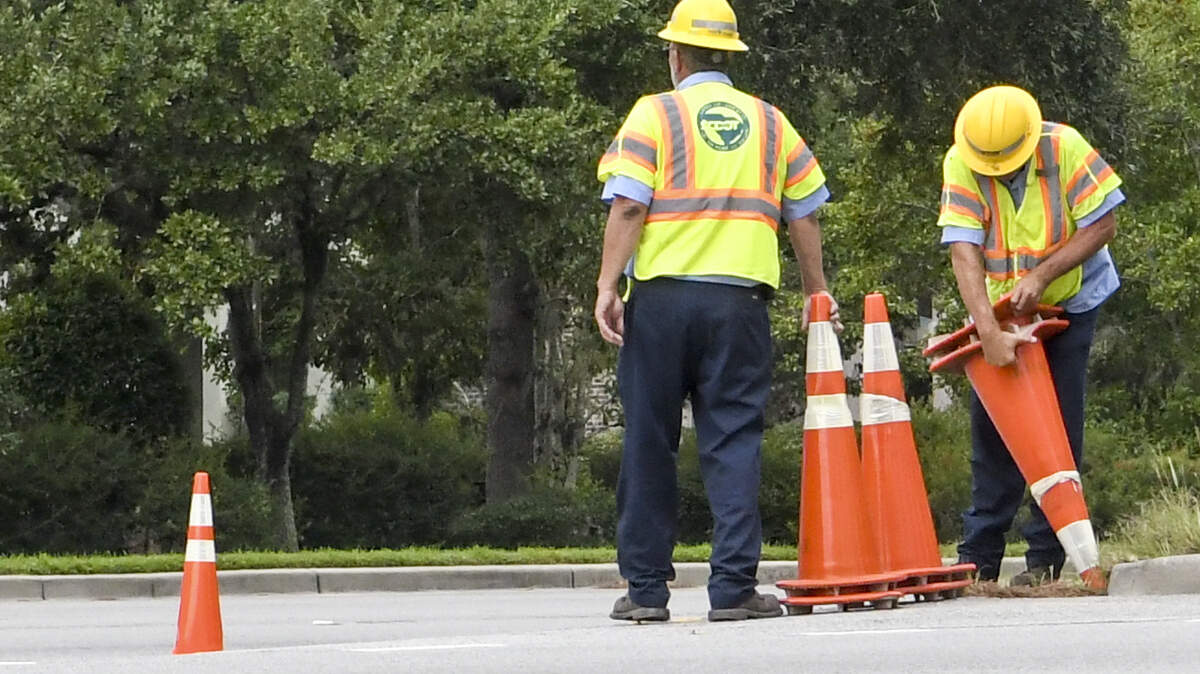 A worker with S.C. Department of Transportation struggles to free pylons in order to use for lane reversals on eastbound U.S. 278 on Sept. 2, 2019 near the base of the bridges to Hilton Head Island. Lane reversals were briefly initiated for the potential arrival of Hurricane Dorian.