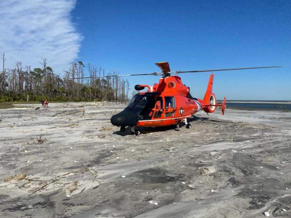 At least four men were in stable condition after they reported being stranded and low on supplies on Tybee Island, Georgia over the weekend in 30 mph winds, according to the U.S. Coast Guard.