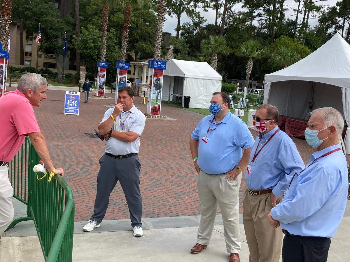 PGA Tour commissioner Jay Monahan, from left, talks with RBC Heritage tournament director Steve Wilmot, Hilton Head assistant town manager Josh Gruber, town manager Steve Riley and Mayor John McCann outside the clubhouse at Harbour Town Golf Links on Wednesday.