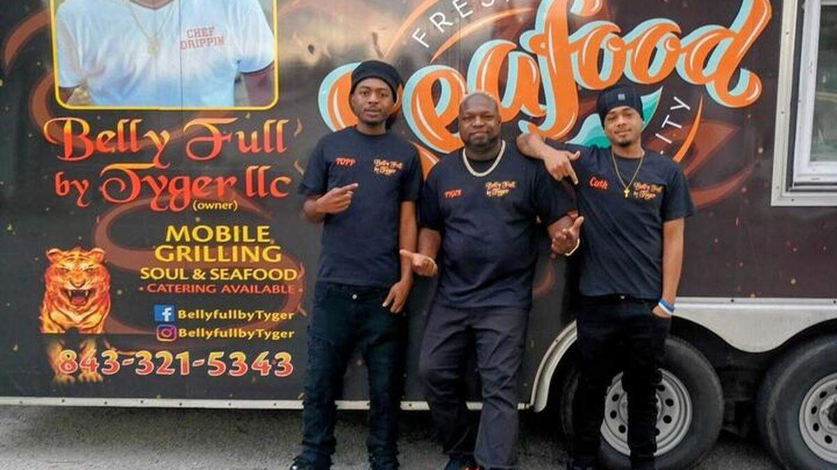 Belly Full by Tyger is closing its Yemassee restaurant location on Jan. 24, but the food trailer continues. From left to right: Topp Snell, manager, Tyger Snell, owner and Ray Ca$h, manager, stand outside the food trailer.