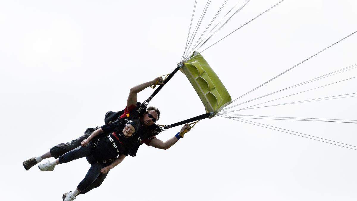 Lucille Lipsitz, of Bloom at Belfair independent-living home, skydives Sunday for her 84th birthday with tandem instructor Zach Hampton of Skydive Walterboro.