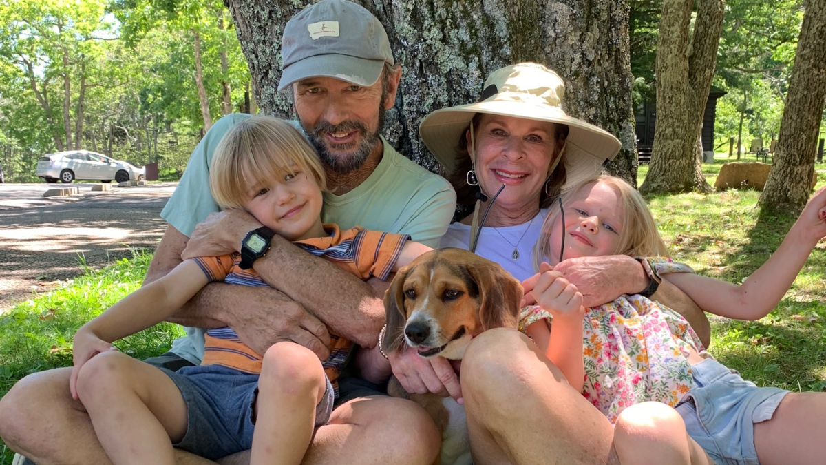 Collins and Karen Doughtie with grandchildren, Benjamin and Alice, and Butterbean the beagle.