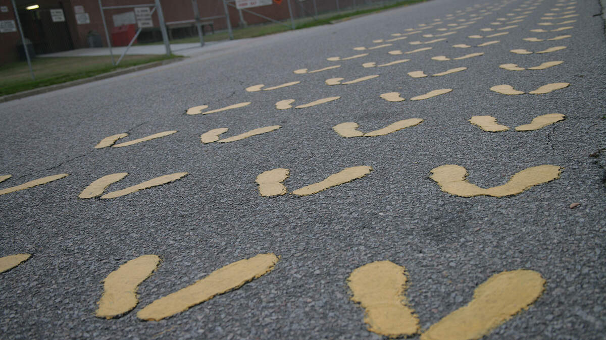 These yellow footprints, which first appeared in 1965,  mark a recruits first steps toward becoming a Marine.