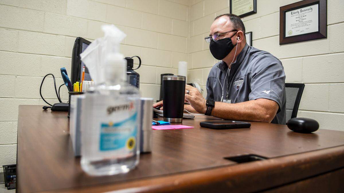 Timothy Sands, physical education teacher at Beaufort Middle School, holds gym class on Tuesday, Sept. 8, 2020 - the first day of school - and tries to calm the fears of students who have questions about the class. The Beaufort County School District started the 2020-21 school year remotely due to the coronavirus pandemic..