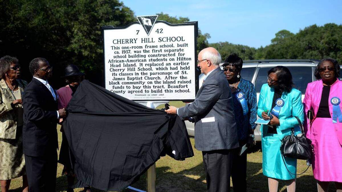 A state historical marker was unveiled in September 2013 at the Cherry Hill School on Hilton Head Island. The school was built in 1937 after parents paid for the land. Former students watched as the late Rev. Charles E. Hamilton Sr. and then-Mayor Drew Laughlin unveiled the marker.