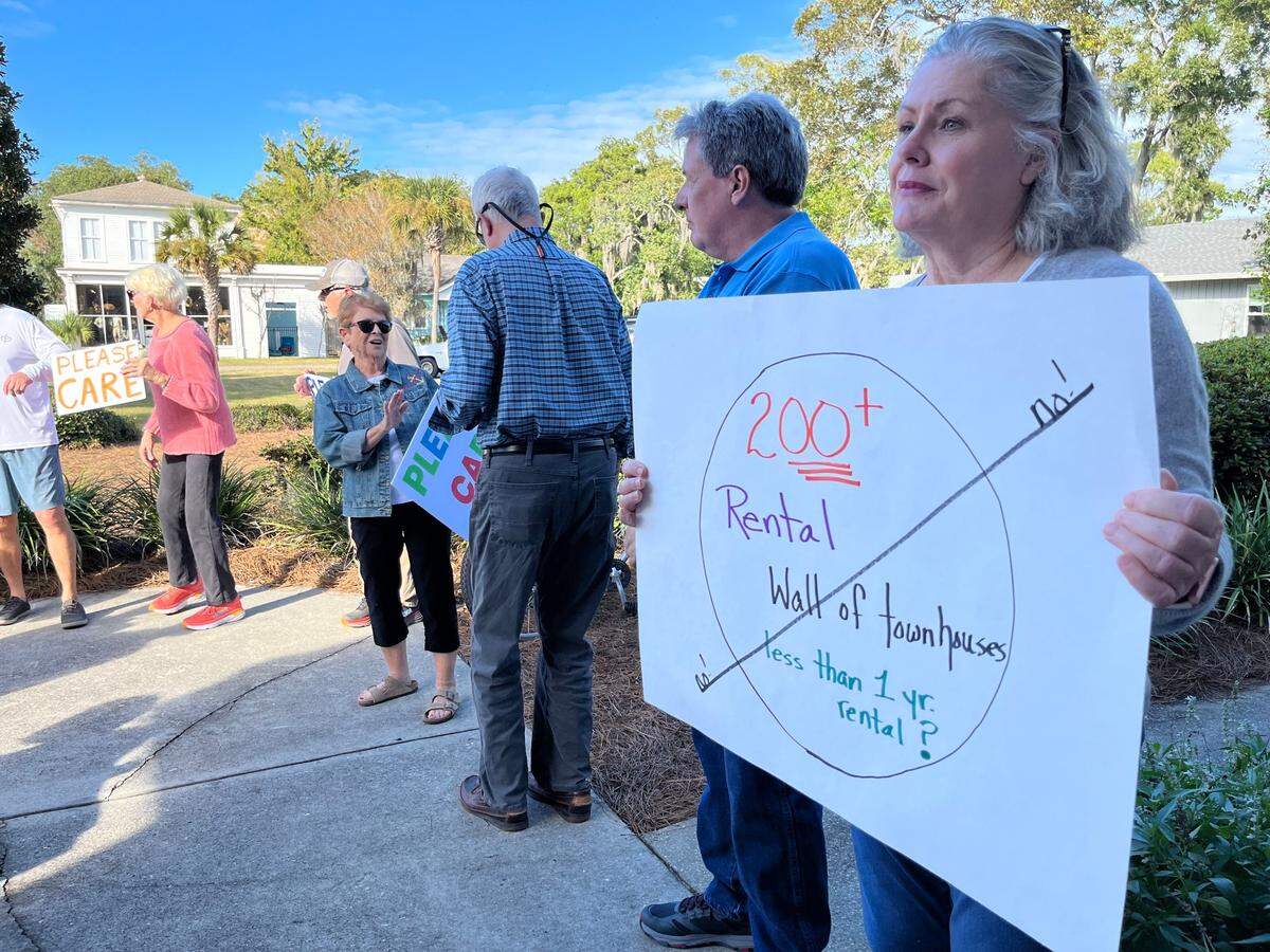 Gail Brazell was one of about 20 Port Royal residents who showed up at the Town Hall Thursday to protest the waterfront development plans of Safe Harbor Marinas. The Town Council held an a behind-closed-doors executive session with Safe Harbor later to discuss those plans.