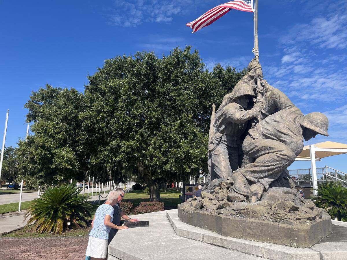 Visitors Roger and Kathy Allen check out the Iwo Jima Monument at Marine Recruit Depot Parris Island in September. Visitors can expect longer waits at the front gate to get onto the base as a result of 133 civilian employees being furloughed Wednesday.