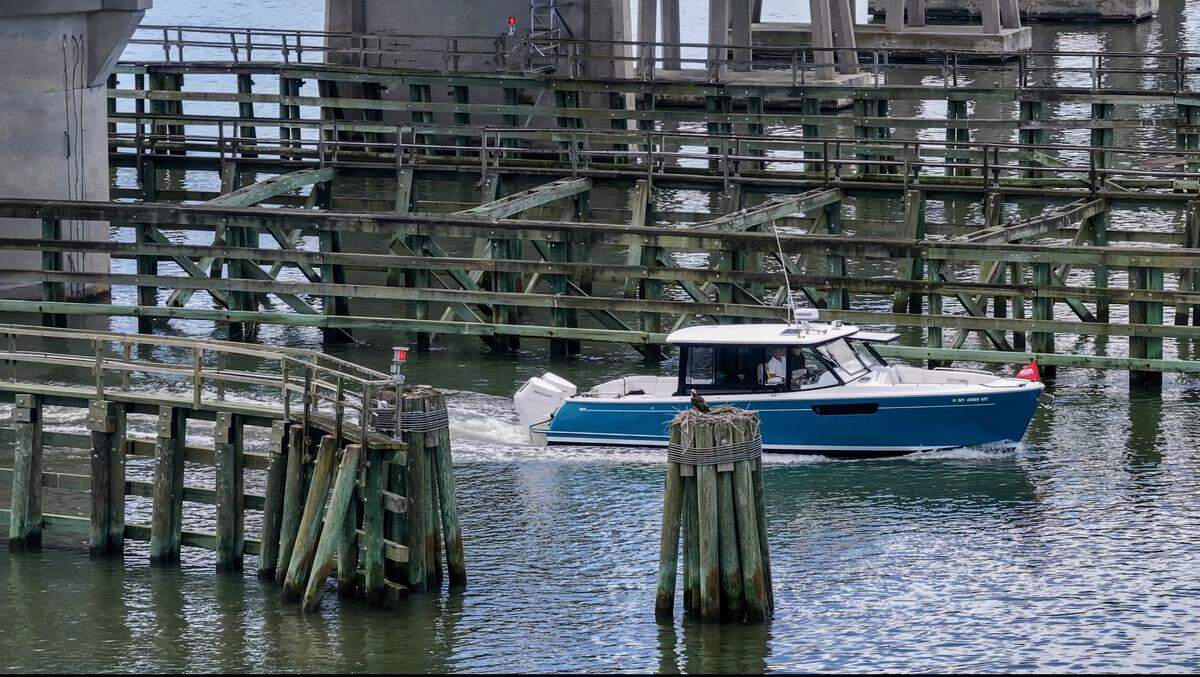 A boater makes their way under the Richard V. Woods Memorial Bridge as photographed on May 19, 2026, on the Intracoastal Waterway’s Beaufort River in Beaufort.