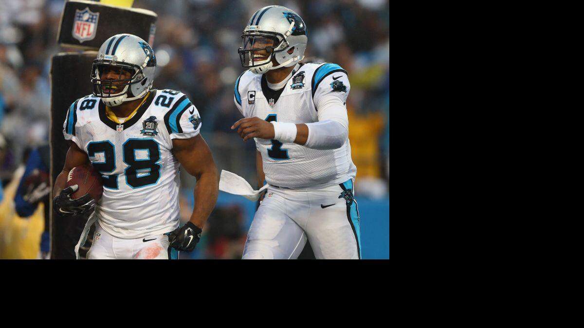 The Carolina Panthers' Cam Newton, right, and Jonathan Stewart.