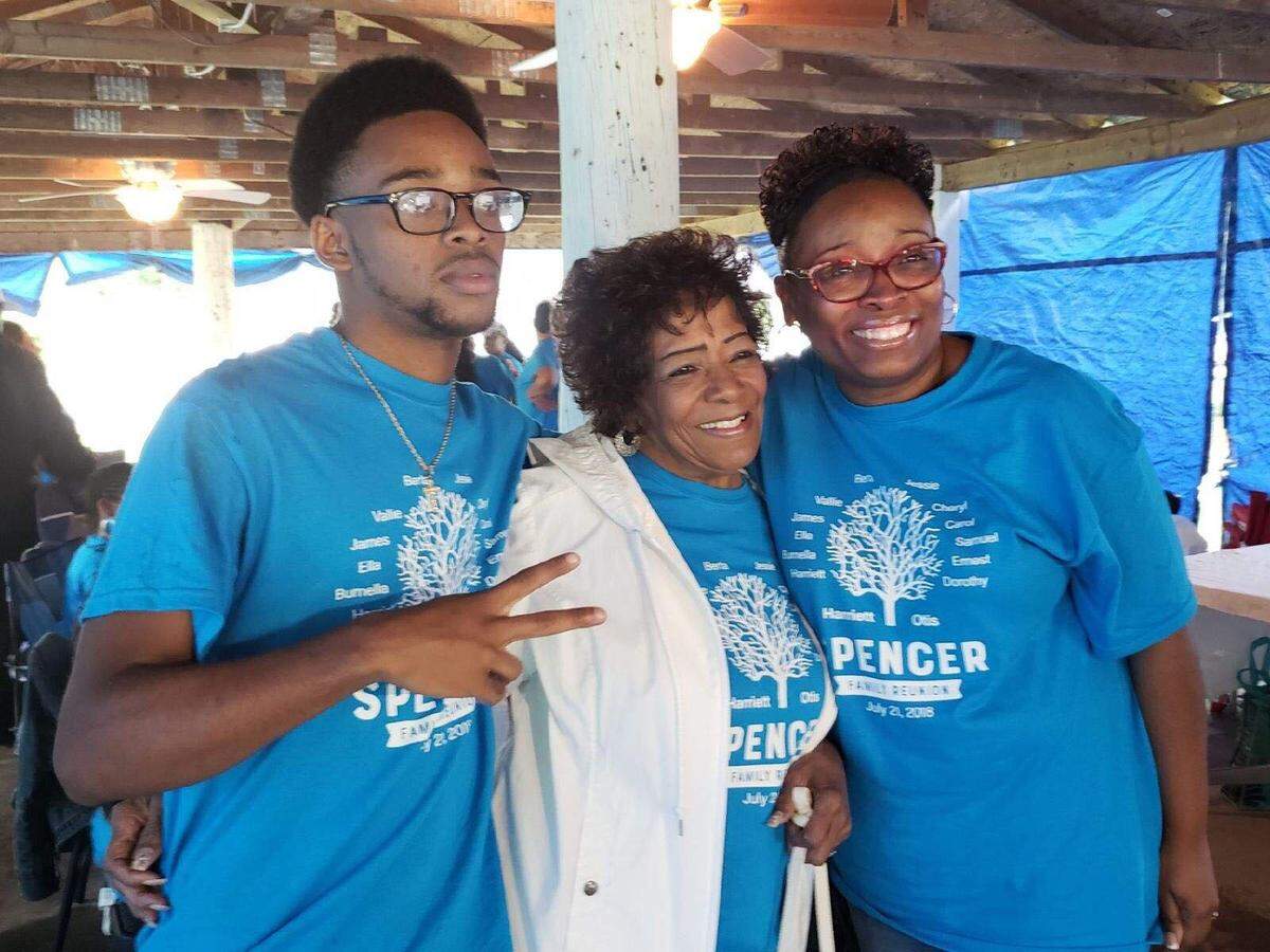 Malik with relatives at a family reunion.