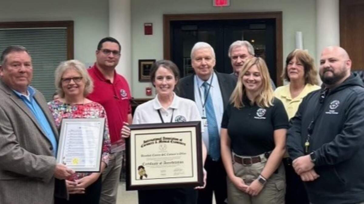 Staff from the Beaufort County Coroner’s Office was recognized at the Dec. 11 County Council meeting for the agency’s recent accreditation with the International Association of Coroners and Medical Examiners (IACME). From left to right: Beaufort County Coroner David W. Ott, Charleston County Coroner Bobbi Jo O’Neal, Deputy Coroner Andy McNese, Forensic Pathologist Dr. Joni Skipper, Accreditation Manager Jefferson Dowling, council vice chair Lawrence McElynn, Deputy Coroner Margaret Bowyer, Chief Deputy Coroner Debbie Youmans, Pathologist Assistant Sheldon Phillips.