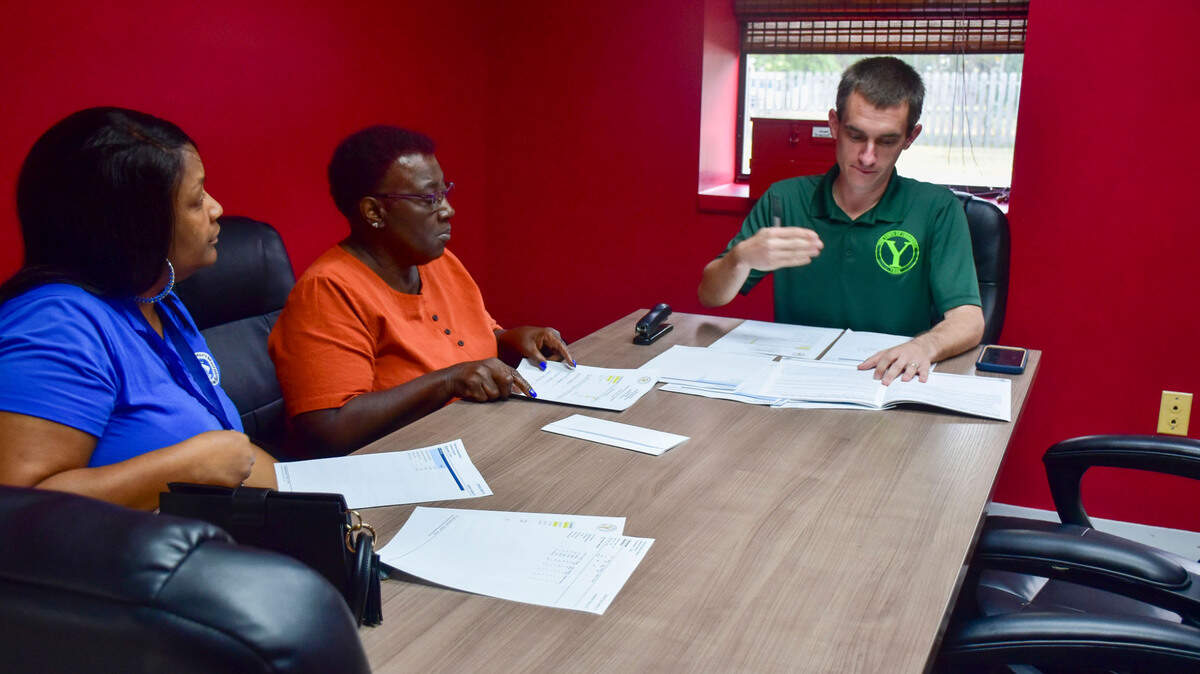 Members of the Yemassee Municipal Elections Committee, Tamyra Smith, Linda Jenkins and Town Administrator Matthew Garnes process the November 2023 returns. Tamyra Smith, Linda Jenkins (Yemassee) and Town Administrator Matthew Garnes certify the election results from Nov 7, 2023. Yemassee sits on both Beaufort and Hampton Counties, and has three voting precincts.