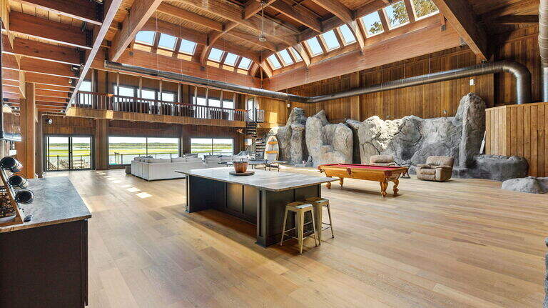 Massive SC waterfront home has custom milled details - take a look