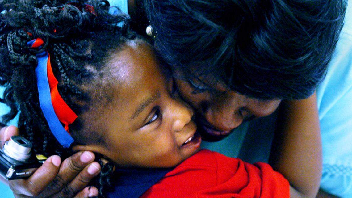 "I don't want to let you go!" said Honika Plowdeniz as she hugged her daughter, kindergartner Amanda Ranger good-bye on Monday morning during the first day of classes at Okatie Elementary School. "Why are you crying?" asked Honika's mother, Inez Plowdeniz, in the hallway. "I'm just happy!" was her daughter's response.