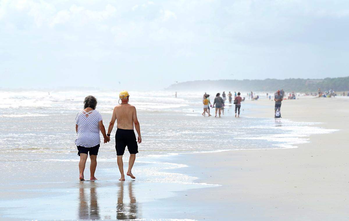 People enjoy the weather on Coligny Beach on South End in Hilton Head Island, SC on Tuesday, September 3, 2019.