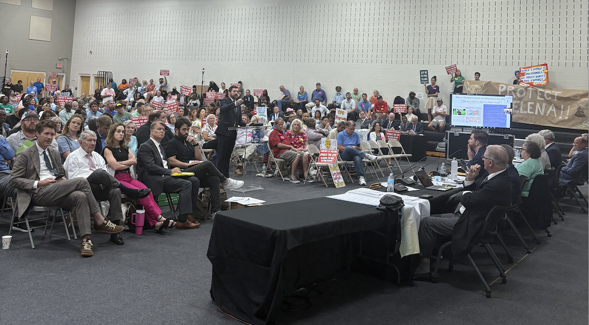 Kevin Dukes, a local real estate attorney who represents the Pine Island developer, presented details about the revised development agreement on Monday night among hundreds of community members.