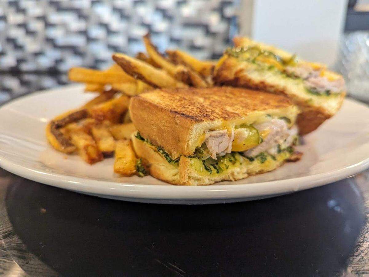 Chunks of yellowfin tuna, with cilantro, house pickles, shrimp mayo and cheddar cheese on brioche.