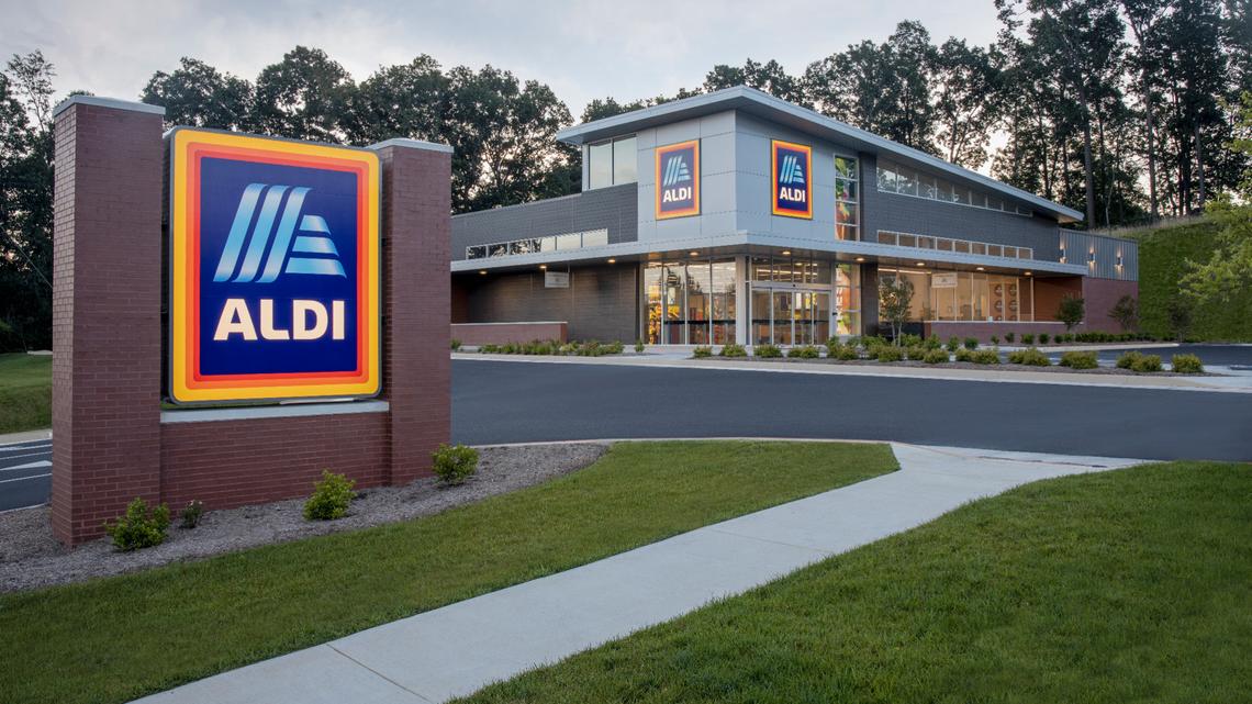 This image provided by Aldi shows the exterior of a store with a tower above the corner entrance.