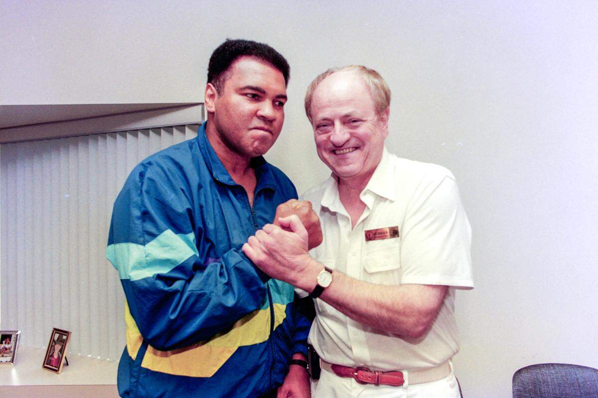 Muhammad Ali, left, is playfully photographed with his medical doctor, Rajko Medenica on Sept. 22, 1992, at Hilton Head Hospital on Hilton Head Island.
