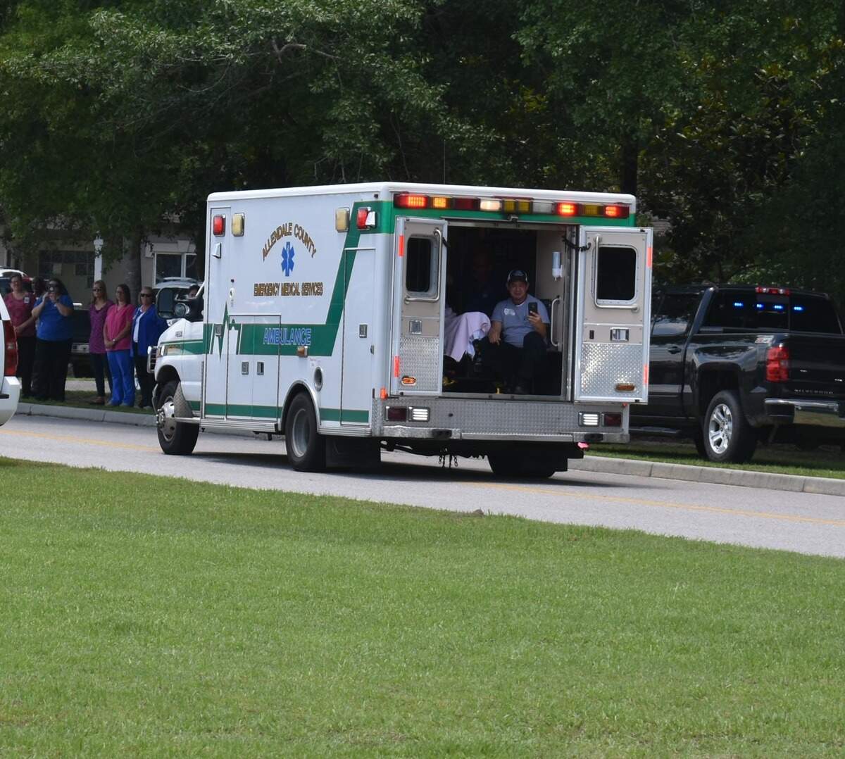 The back doors of the ambulance David Cook was riding in were open so he could see all of the people who lined the streets to support him.