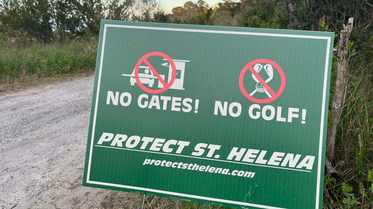 Signs opposing the construction of golf courses and a gated community in the St. Helenaville area of St. Helena Island have popped up across the island and beyond.