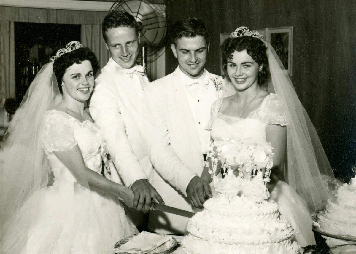Margie and Benny Kemper, left, pose with her sister, Gladys Souhrada, and her new husband, Thomas Souhrada, at the couples’ double-wedding on Saturday, Aug. 22, 1959, in Bay Shore, New York.
