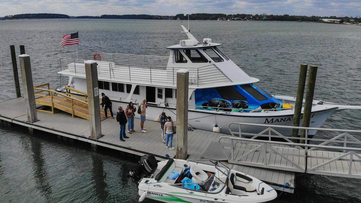Daufuskie Island residents wait for their belongings after disembarking from the Manatee II, the new larger ferry contracted by Beaufort County to move people and their belongings to and from the island to the mainland as photographed on Jan. 31, 2024 at C.C. Haigh Jr. Boat Landing on Pinckney Island.