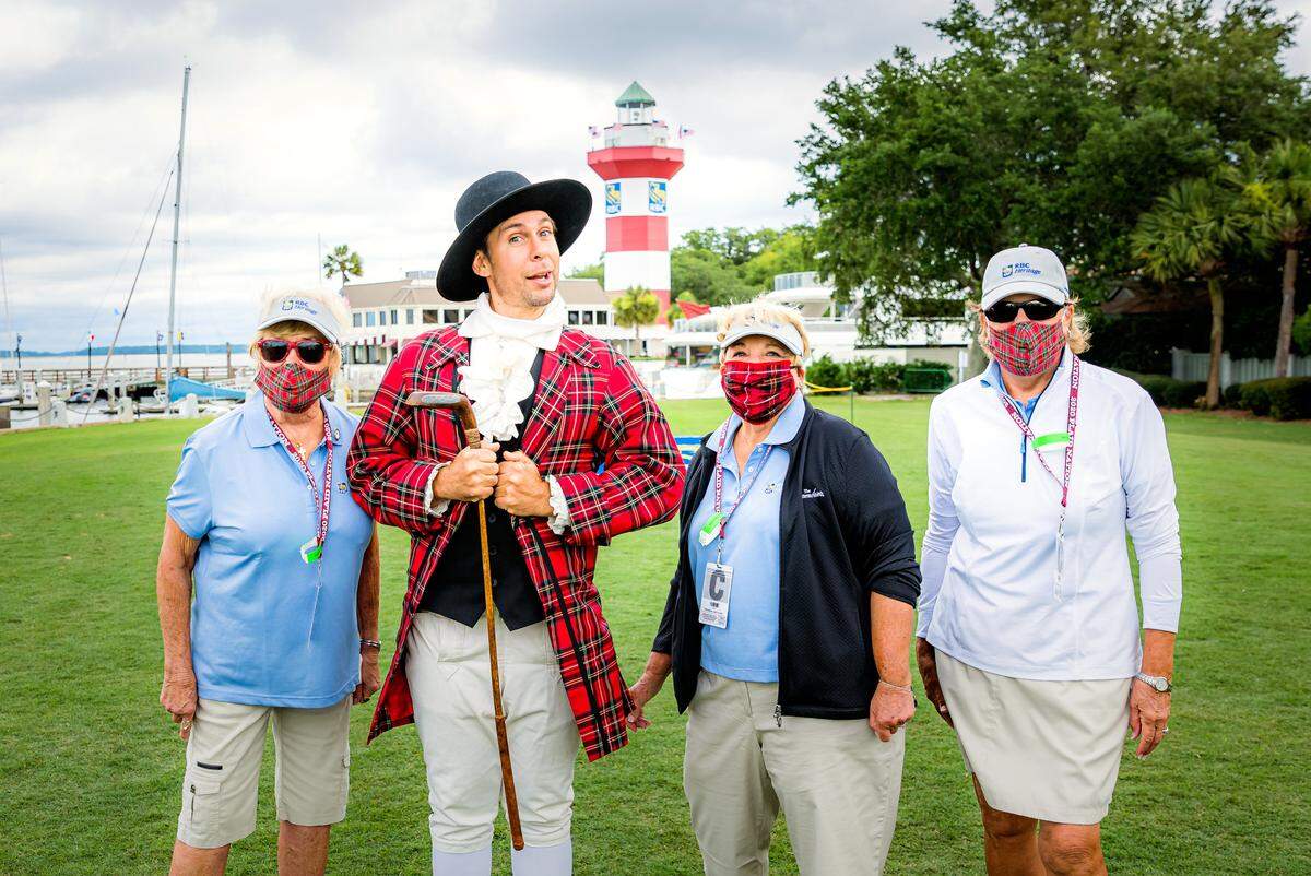 RBC Heritage mascot Sir Willie Innes, second from left, poses for a photo with plaid-masked volunteers at the opening ceremony on Wednesday, June 17, 2020 at Harbour Town Golf Links in Sea Pines on Hilton Head Island.