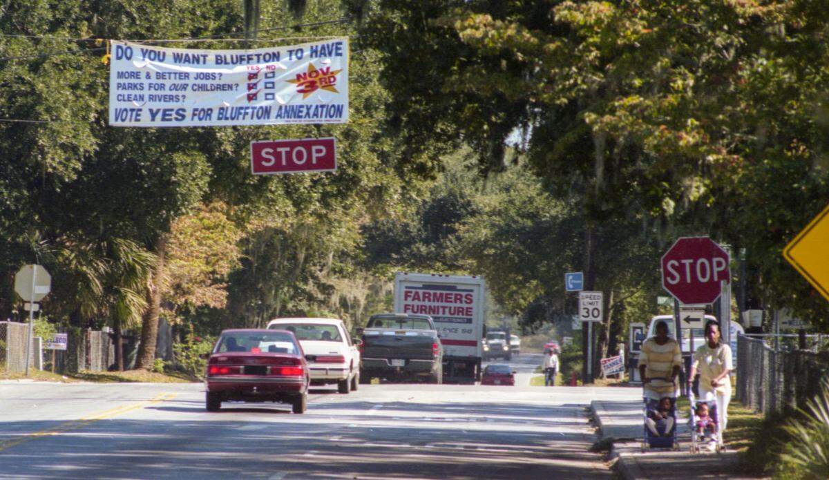 This file photo from Oct. 27, 1998 shows a banner flying over Bluffton’s four-way stop on S.C. 46 asking residents to vote yes for the annexation of Union Camp (Palmetto Bluff) into the town.