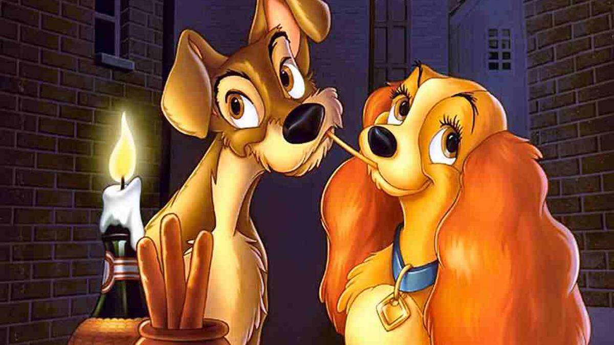 Lady and the Tramp share a dish of spaghetti, which leads to a surprise kiss, in the 1955 Disney movie.