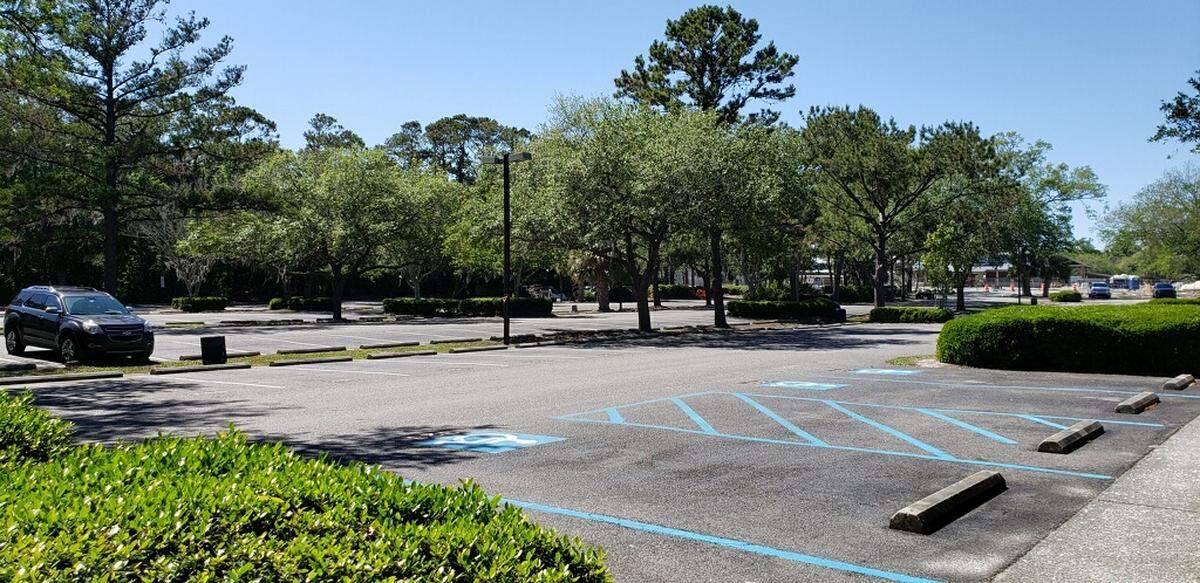 Coligny Beach Parking Lot on Hilton Head Island photographed Friday, May 1 as it reopens to beach pass holders.