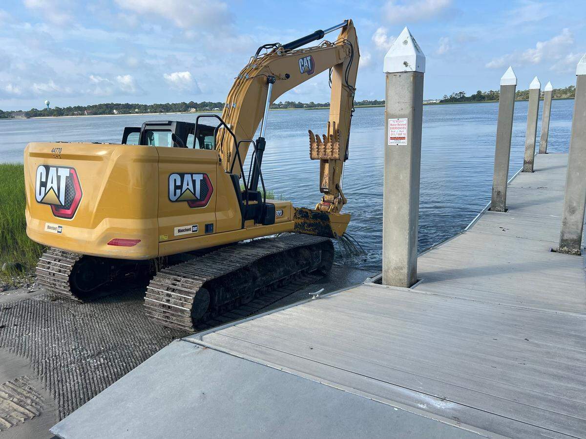 The Beaufort County Public Works Department and Lady’s Island Fire Department assisted in removing silt and sand deposits during a temporary closure of the Russ Point Boat Landing on Hunting Island.