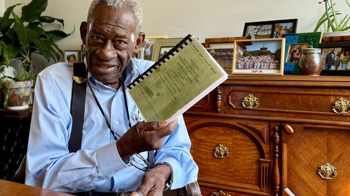Thomas C. Barnwell Jr. holds up the transcript of testimony about poverty in the South Carolina Lowcountry that he and others made before the U.S. Senate Select Subcommittee on Nutrition and Human Needs in February 1969.
