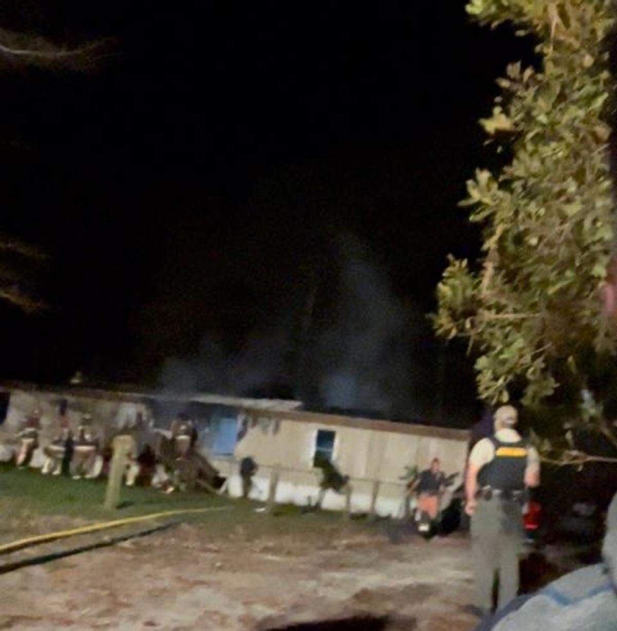 Two people were injured in an early morning fire a mobile home in Burton.