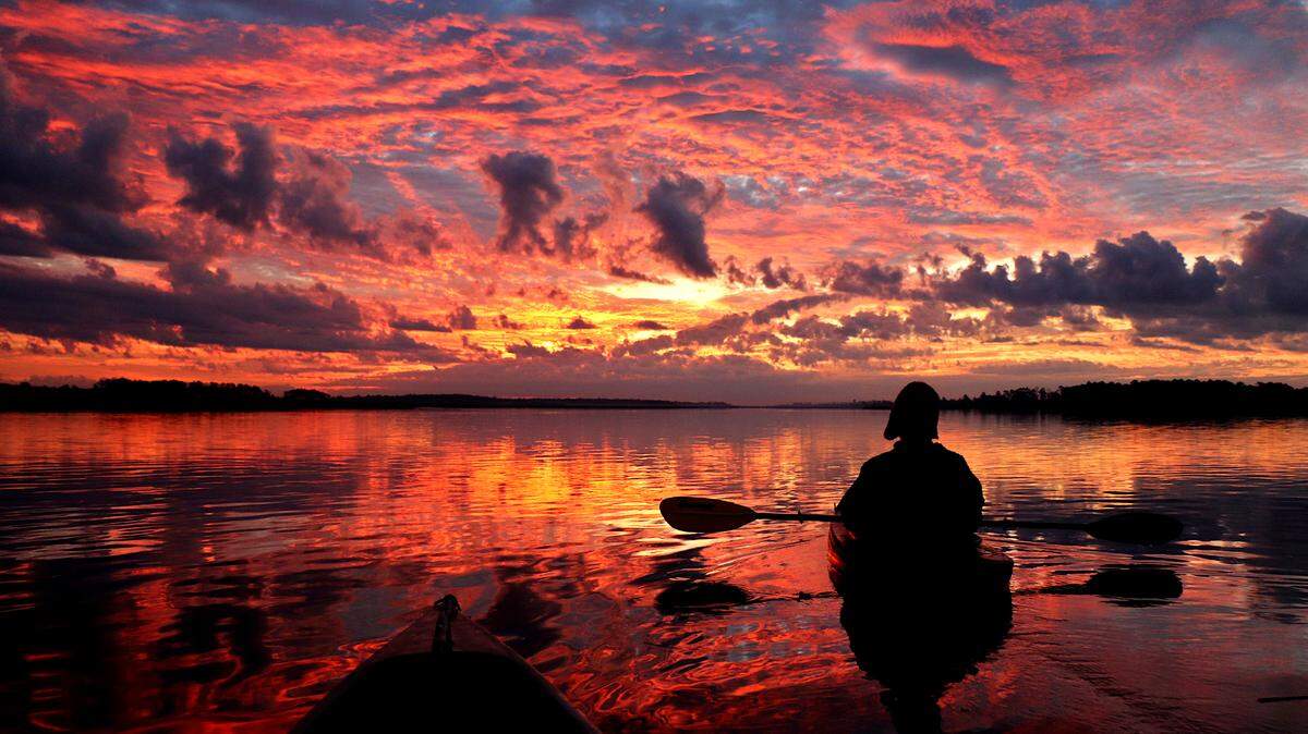 Fire in the sky: A predawn kayaking trip always has its rewards but the Lowcountry sky above Wimbee Creek near Seabrook provides a panoramic view of a sunrise that can never be forgotten. Here, kayaker James Brown of Bluffton is silhouetted by an explosion of color and light that promises a new day.