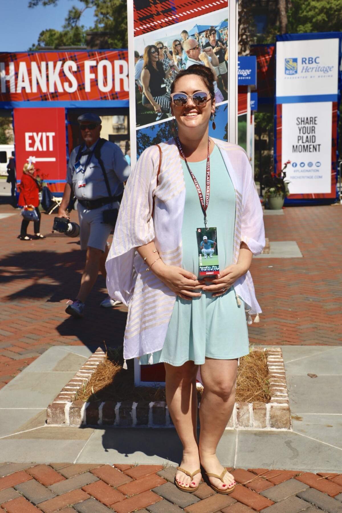 Traci Clawson’s beautiful mint dress caught my eye and I loved the way she used a lightweight kimono to add some contrast to her overall look. Traci’s outfit is the perfect blend of comfy, casual and darling. Her best friend Lauren Byerly wears a rainbow jumpsuit and gives us all the retro vibes in her outfit. For Lauren, this year at Heritage is extra special as she celebrates her wedding anniversary. Lauren and her husband were married here in Sea Pines on the 18th in March of last year.