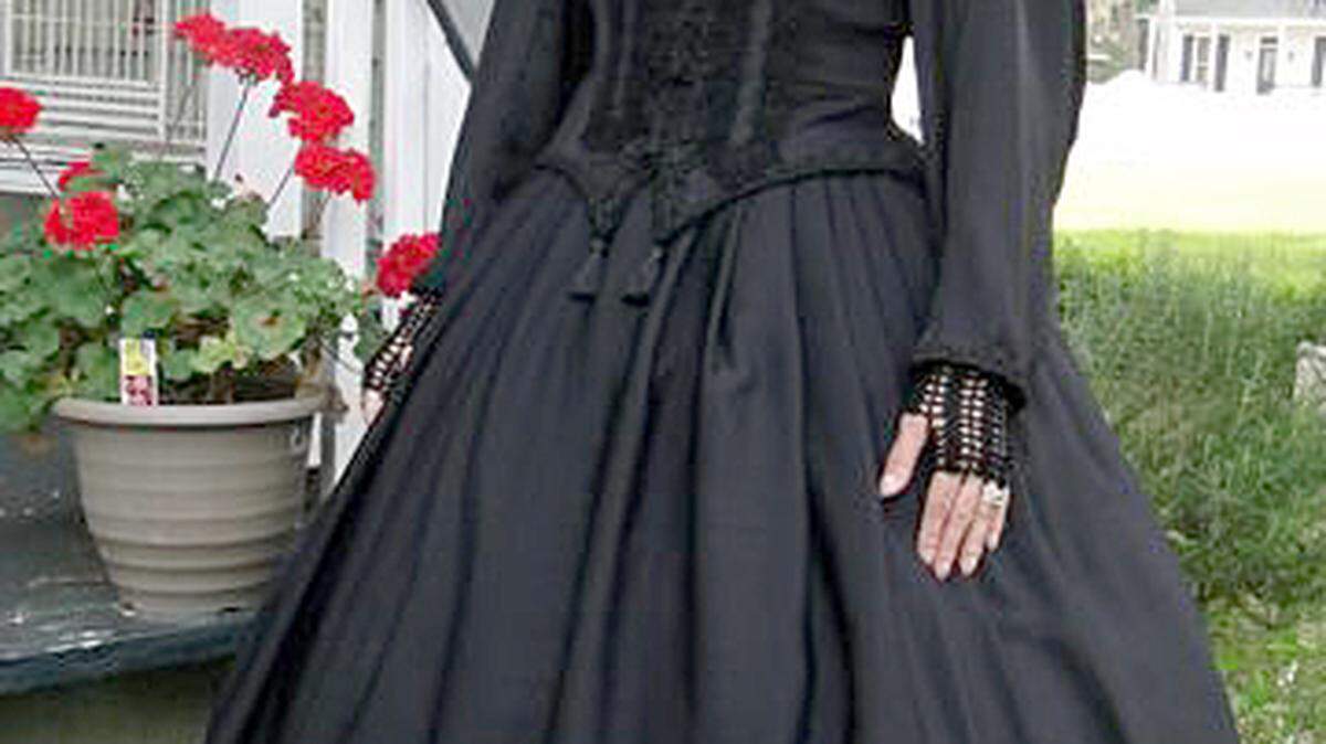 In this handout photo, Beaufort resident Kim Poovey models a handmade, Victorian mourning dress.