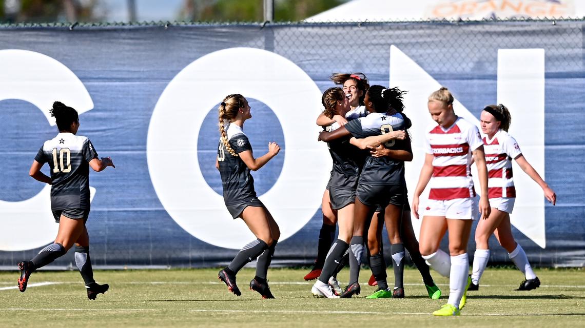 Vanderbilt Women’s Soccer midfielder Abi Brighton, second from left, celebrating with teammates after bringing down No. 6 Arkansas at the SEC tournament in Orange Beach, Ala., Nov. 22, 2020.