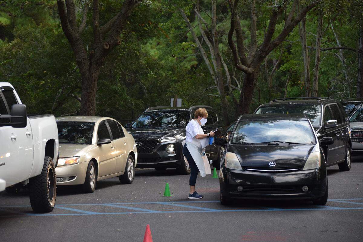 Staff members at the Boys & Girls Club of Hilton Head Island took kids’ temperatures before letting them inside on the first day of online-only classes in Beaufort County public schools on Sept. 8, 2020.