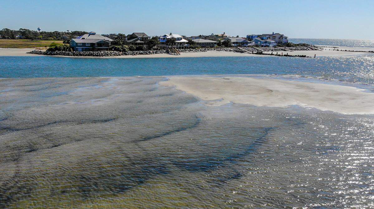 Pictured is the southern tip of Fripp Island as seen on Friday, April 8, 2022 from a drone launched from Pritchards Island that shows the island’s rock revetment and groins. The island’s revetment reduces the impact of the Atlantic Ocean’s waves while the groins limit the movement of sand - reducing the movement of sand to Pritchards Island.