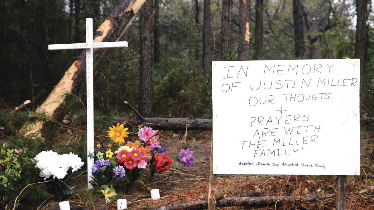  A memorial with flowers and a cross were set up over the weekend at the site of a fatal accident Friday evening in Beaufort.