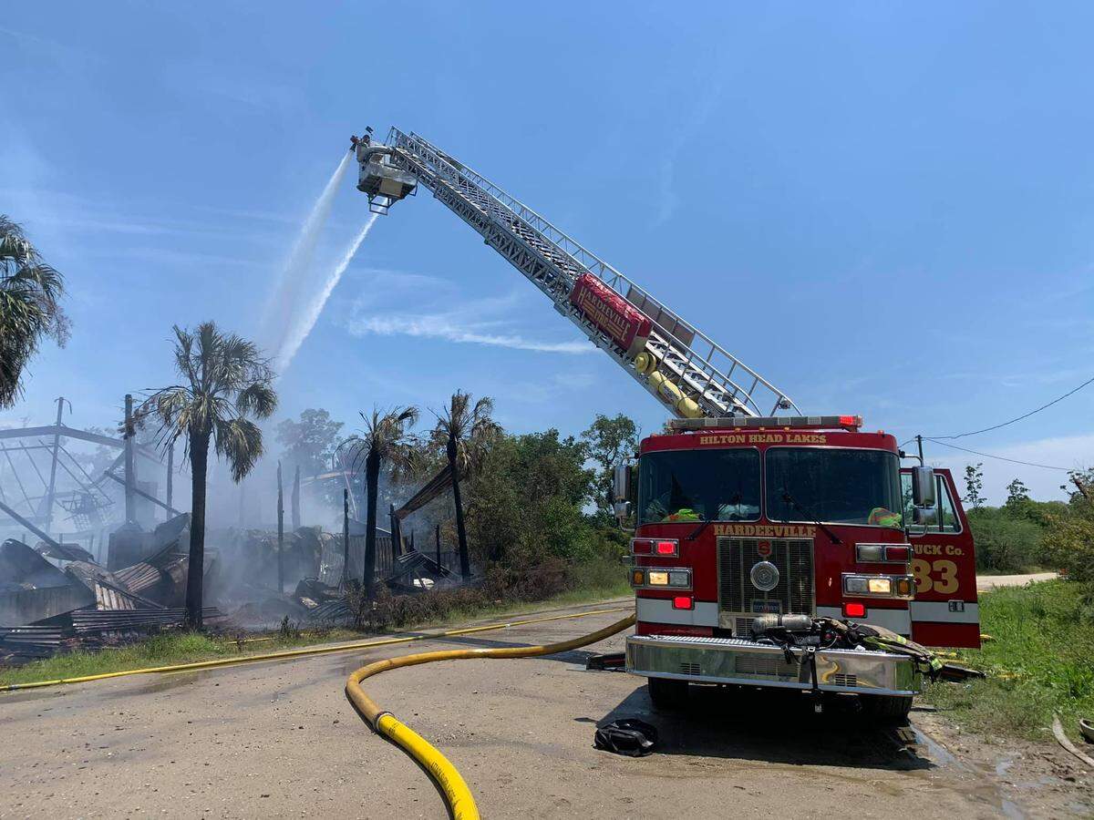 A fire destroyed an abandoned building north of the Talmadge Memorial Bridge at the Georgia, South Carolina border on Wednesday, July 15, 2020.