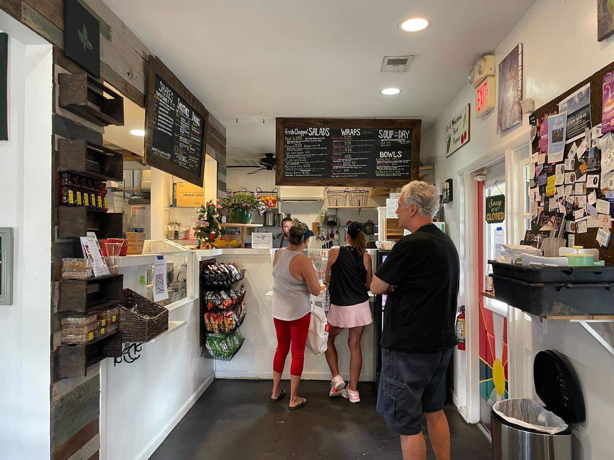 Customers wait for their food at delisheeyo on Hilton Head on Monday, December 29, 2025. A hit-and-run last week forced the health food restaurant to close for two days during the busy holiday season.